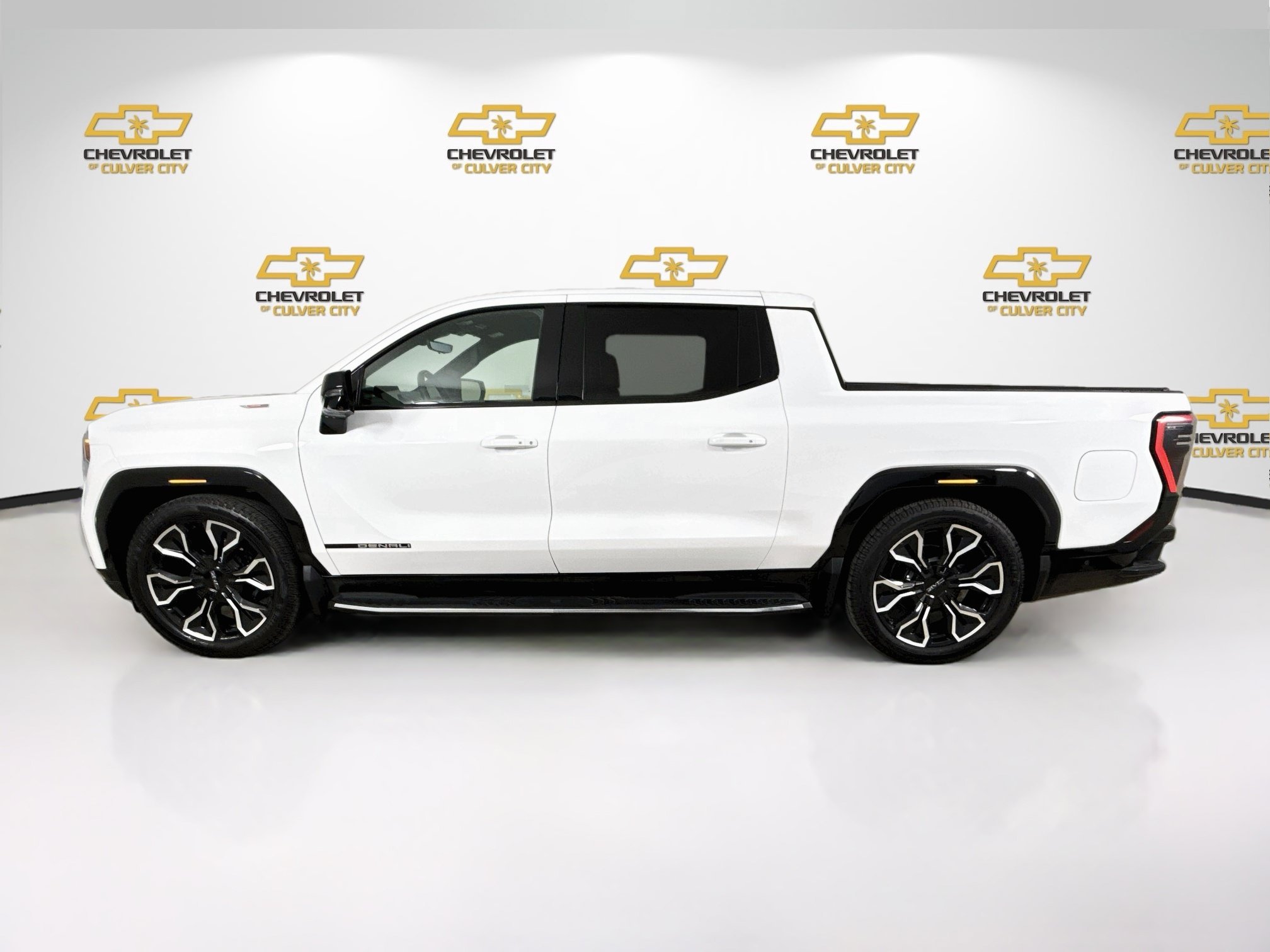 Used 2025 Summit White GMC Max Range Denali image 5
