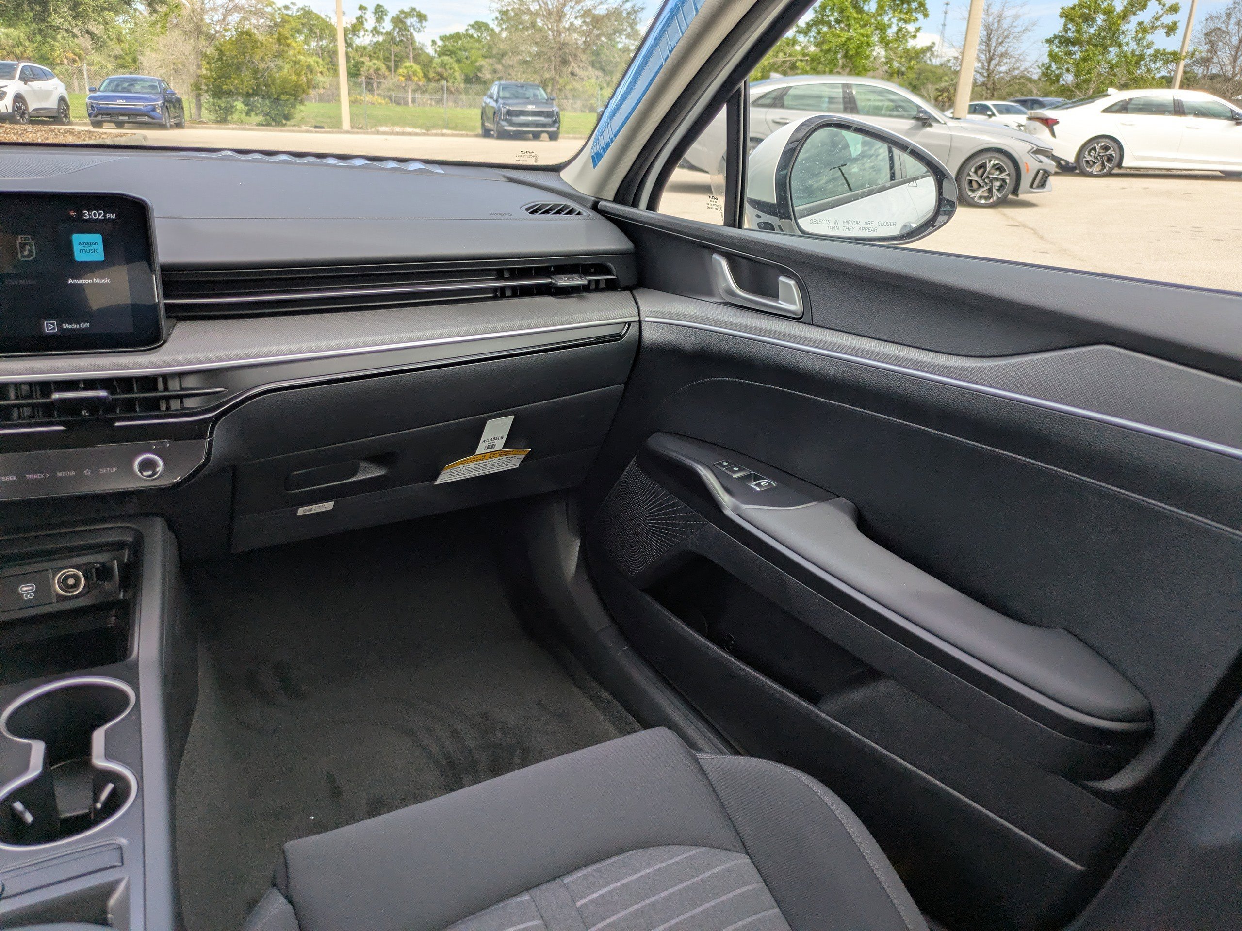 New 2026 Snow White Pearl Kia LXS FWD image 19