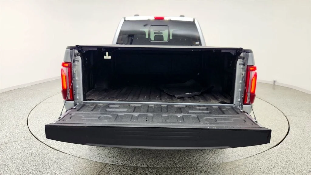 Used 2025 Iconic Silver Metallic Ford LARIAT 4WD SuperCrew 6.5