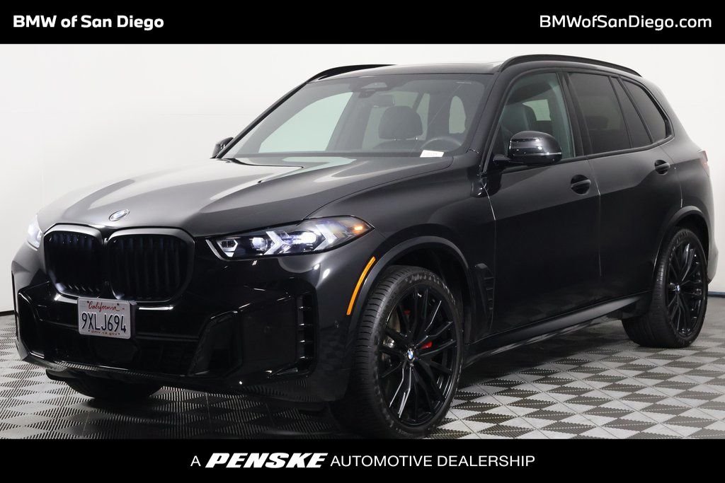 Certified Used 2026 Black Sapphire Metallic BMW sDrive40i image 1