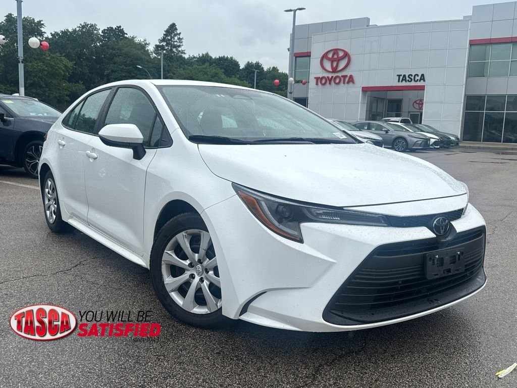 Used 2024 White Toyota LE image 1