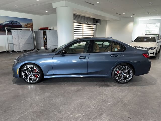 New 2026 Arctic Race Blue metallic BMW 330i image 4