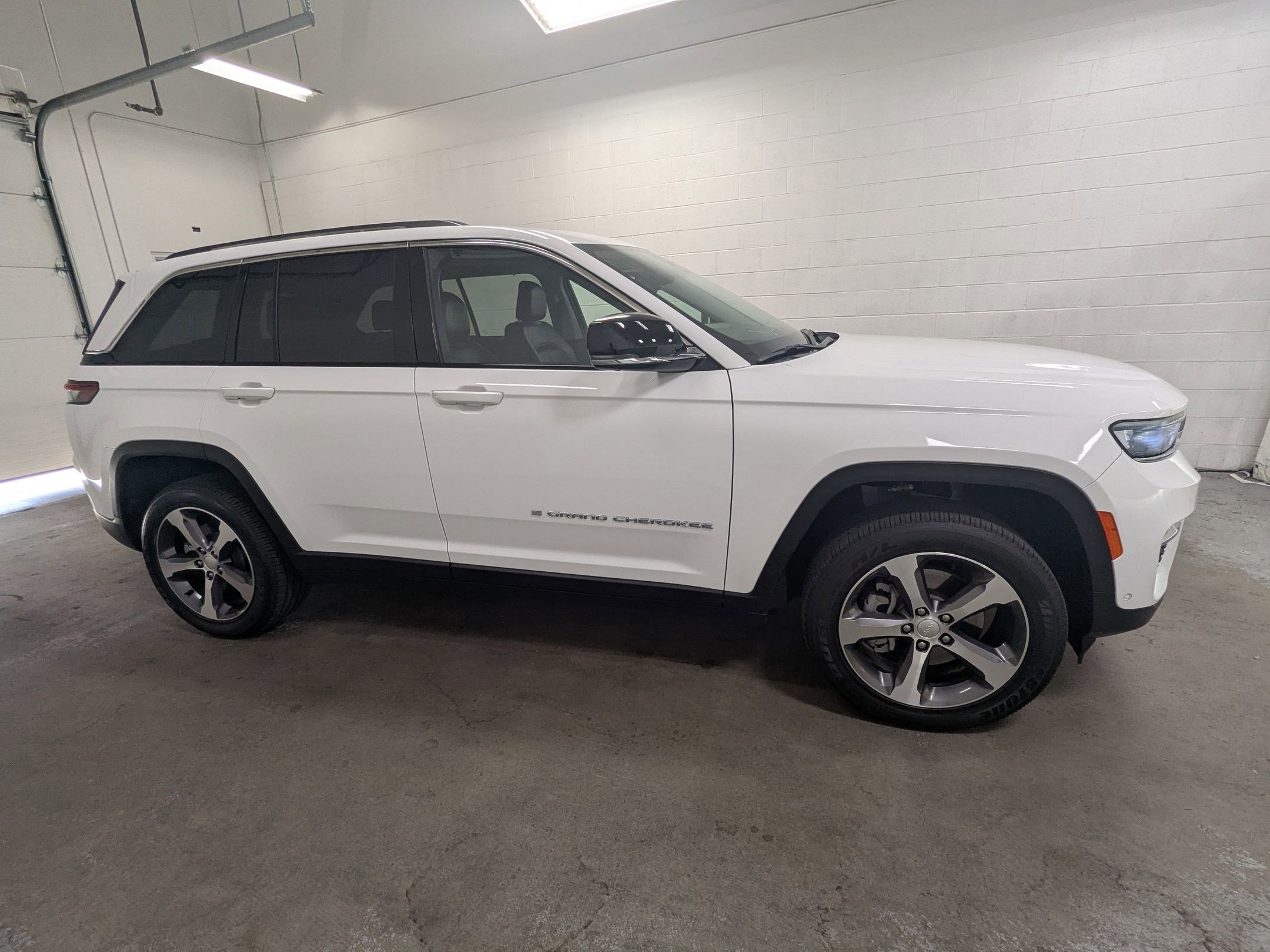Used 2023 Bright White Clearcoat Jeep 4xe image 3