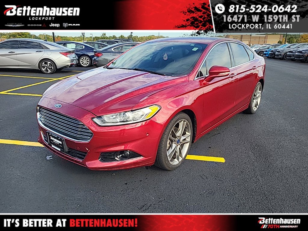 Used 2016 Red Ford Titanium image 1