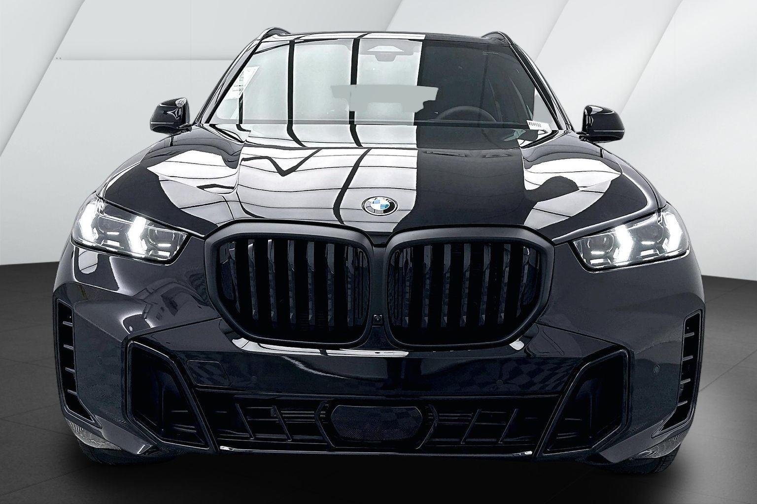 New 2026 Black Sapphire Metallic BMW xDrive40i image 2