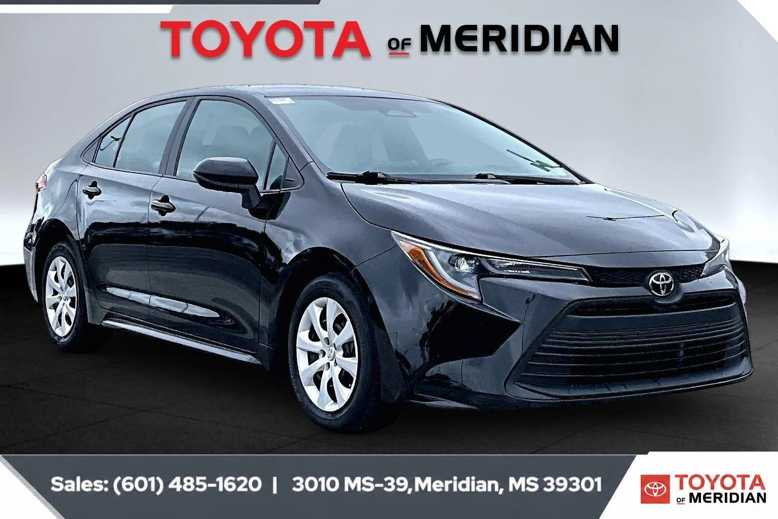 Used 2024 Midnight Black Metallic Toyota LE image 1