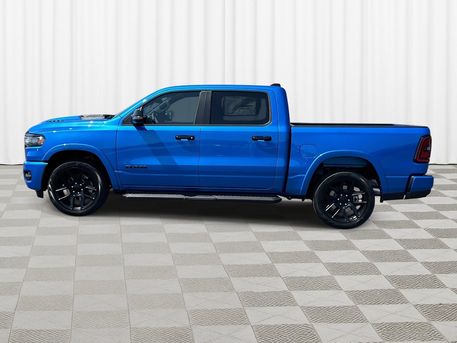 New 2026 Hydro Blue Pearl-Coat Exterior Paint RAM Laramie image 8
