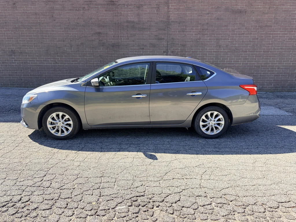Used 2018 Gun Metallic Nissan SV image 2