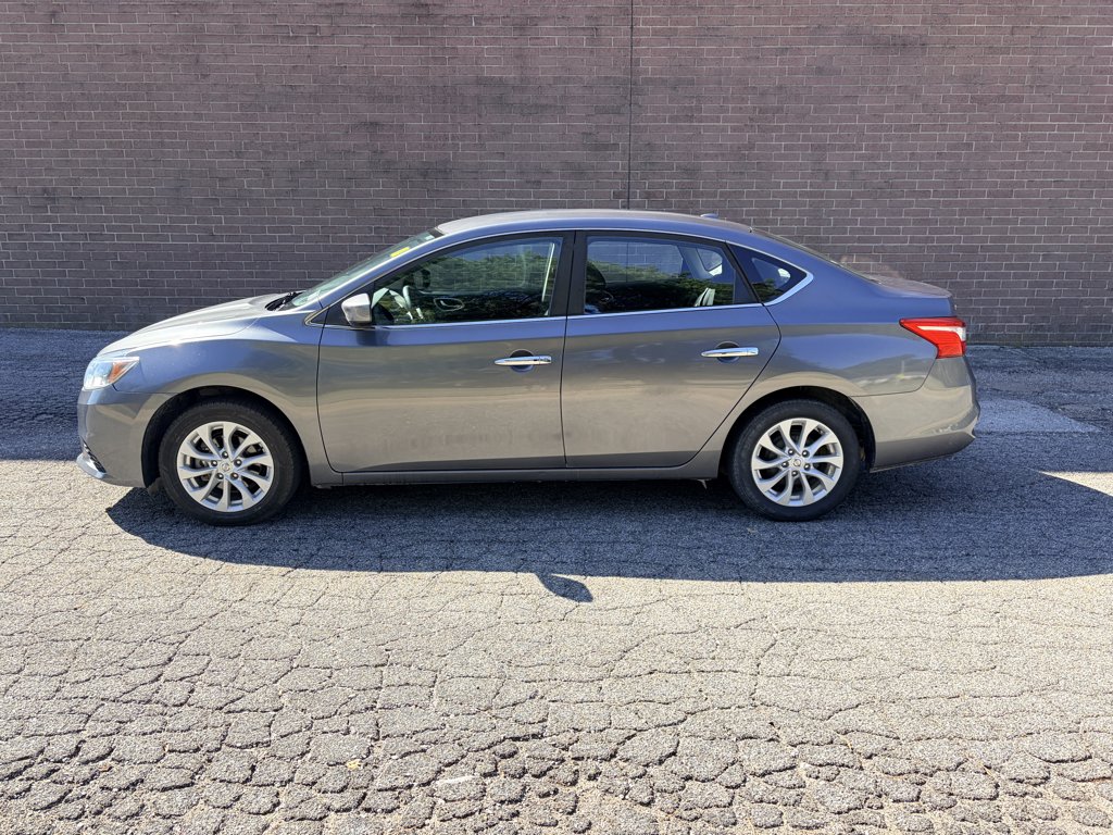 Used 2018 Gun Metallic Nissan SV image 2