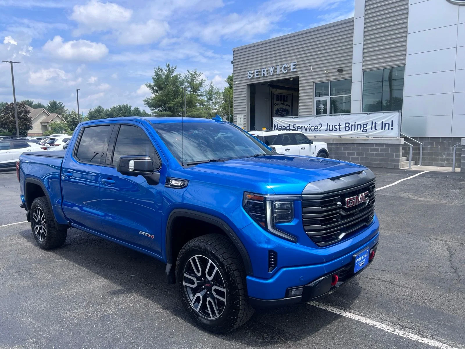 Used 2024 Blue Metallic GMC AT4 image 6