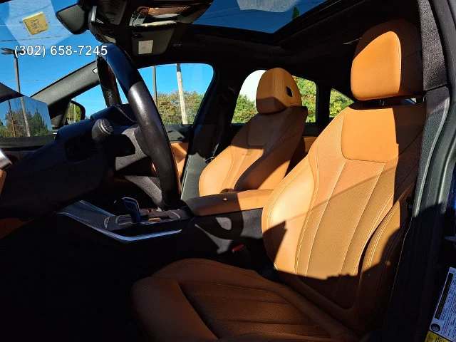Certified Used 2022 Tanzanite Blue II Metallic BMW eDrive40 image 11