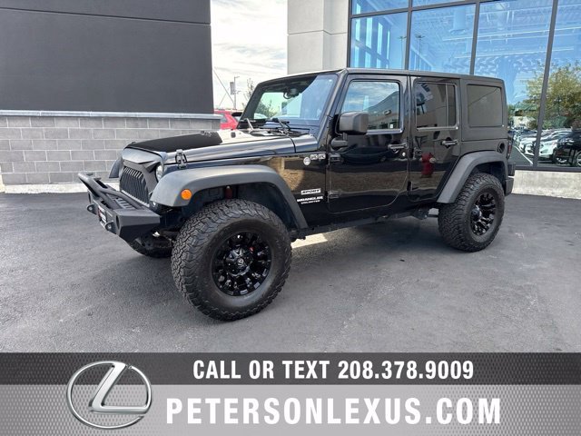 Used 2016 Black Jeep Unlimited Sport image 2