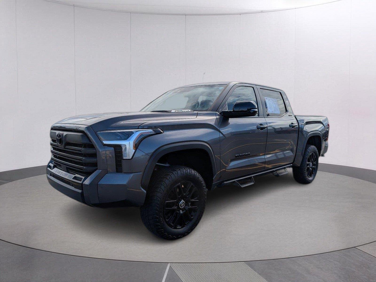 Used 2024 Magnetic Gray Metallic Toyota Limited HV image 1