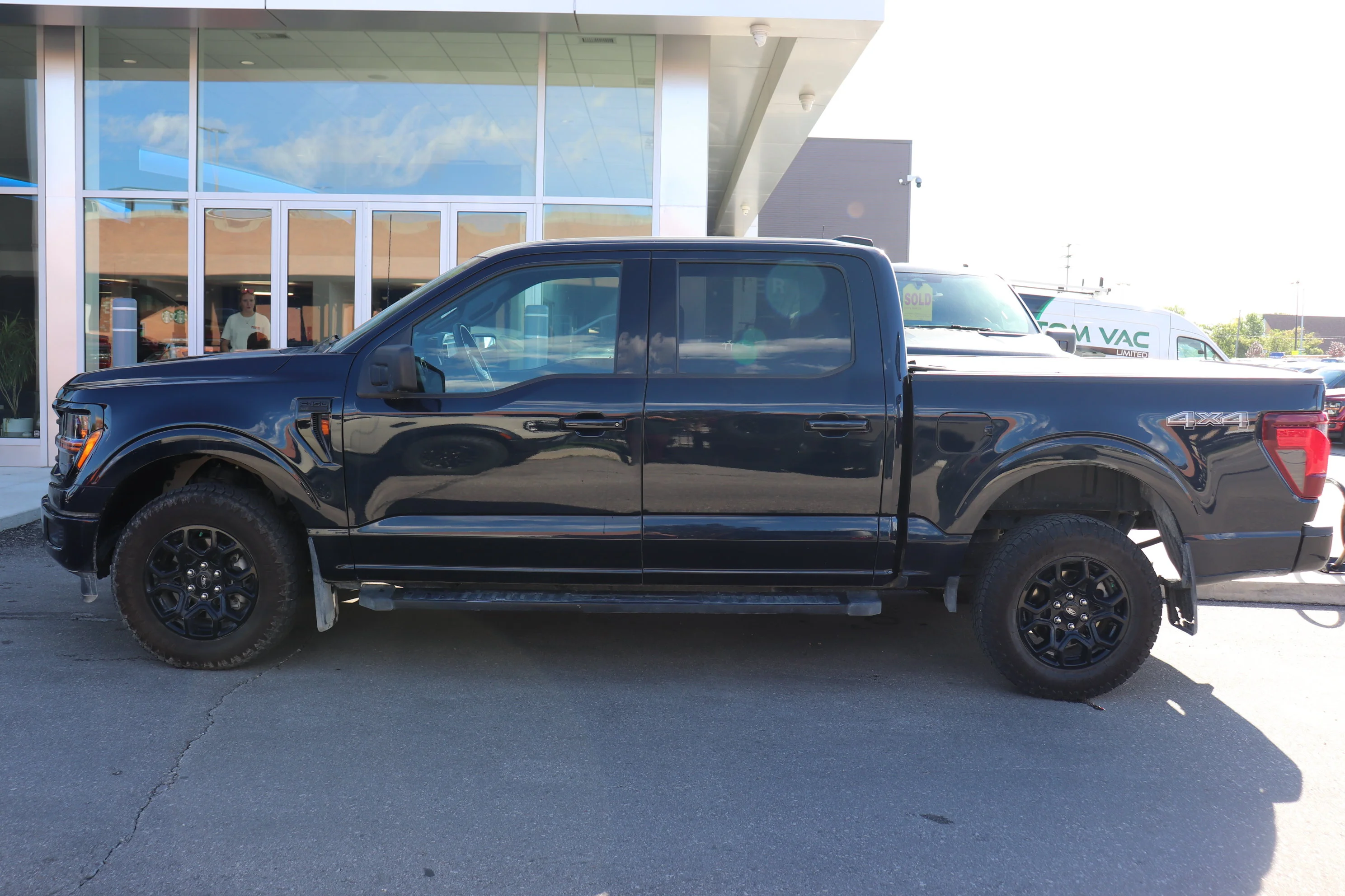 Used 2023 Black Ford XL 4WD SuperCrew 5.5