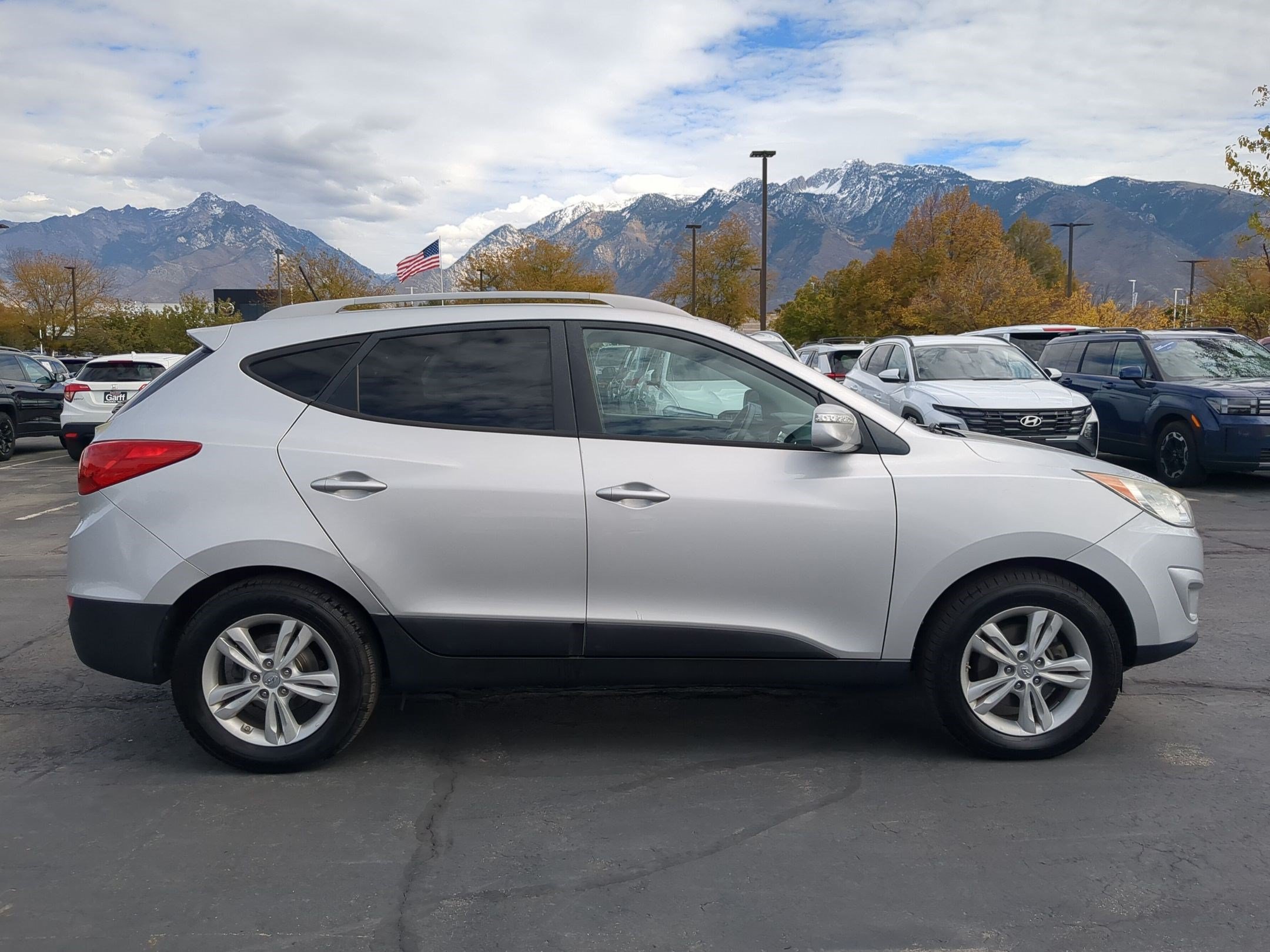 Used 2013 Hyundai Tucson GLS with VIN KM8JUCAC9DU624201 for sale in Sandy, UT