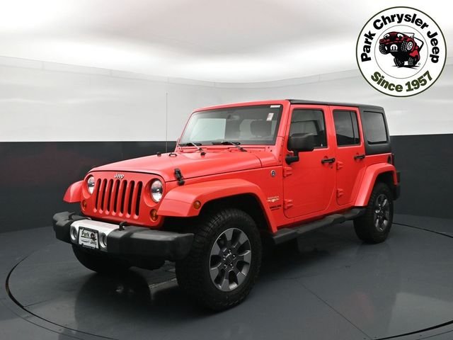 Used 2013 Jeep Wrangler Unlimited Sahara with VIN 1C4HJWEG2DL612827 for sale in Burnsville, Minnesota