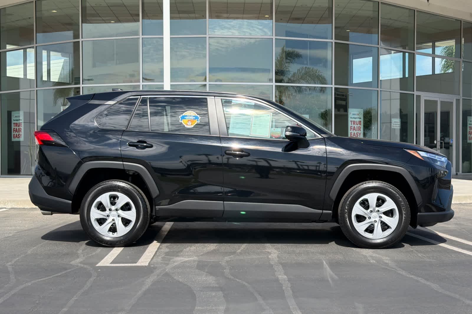 Used 2024 Midnight Black Metallic Toyota LE image 3