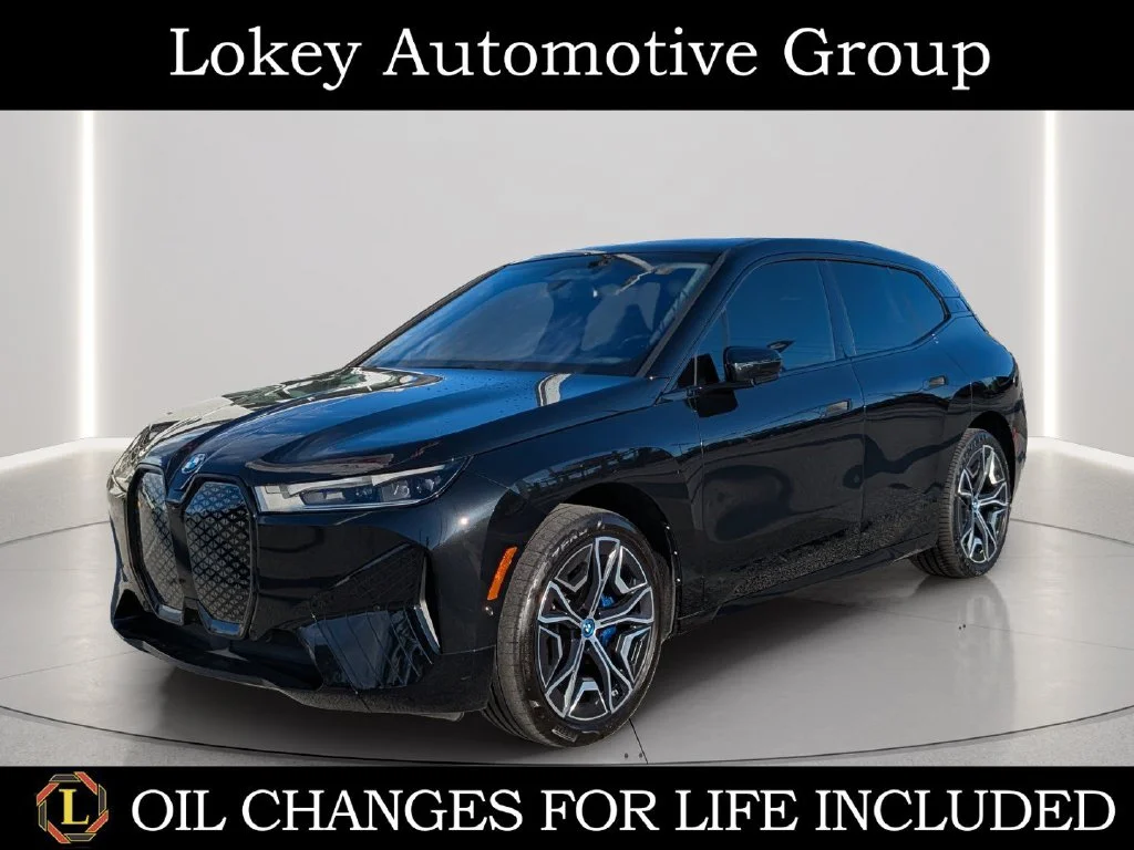 Used 2024 Black BMW xDrive50 image 1