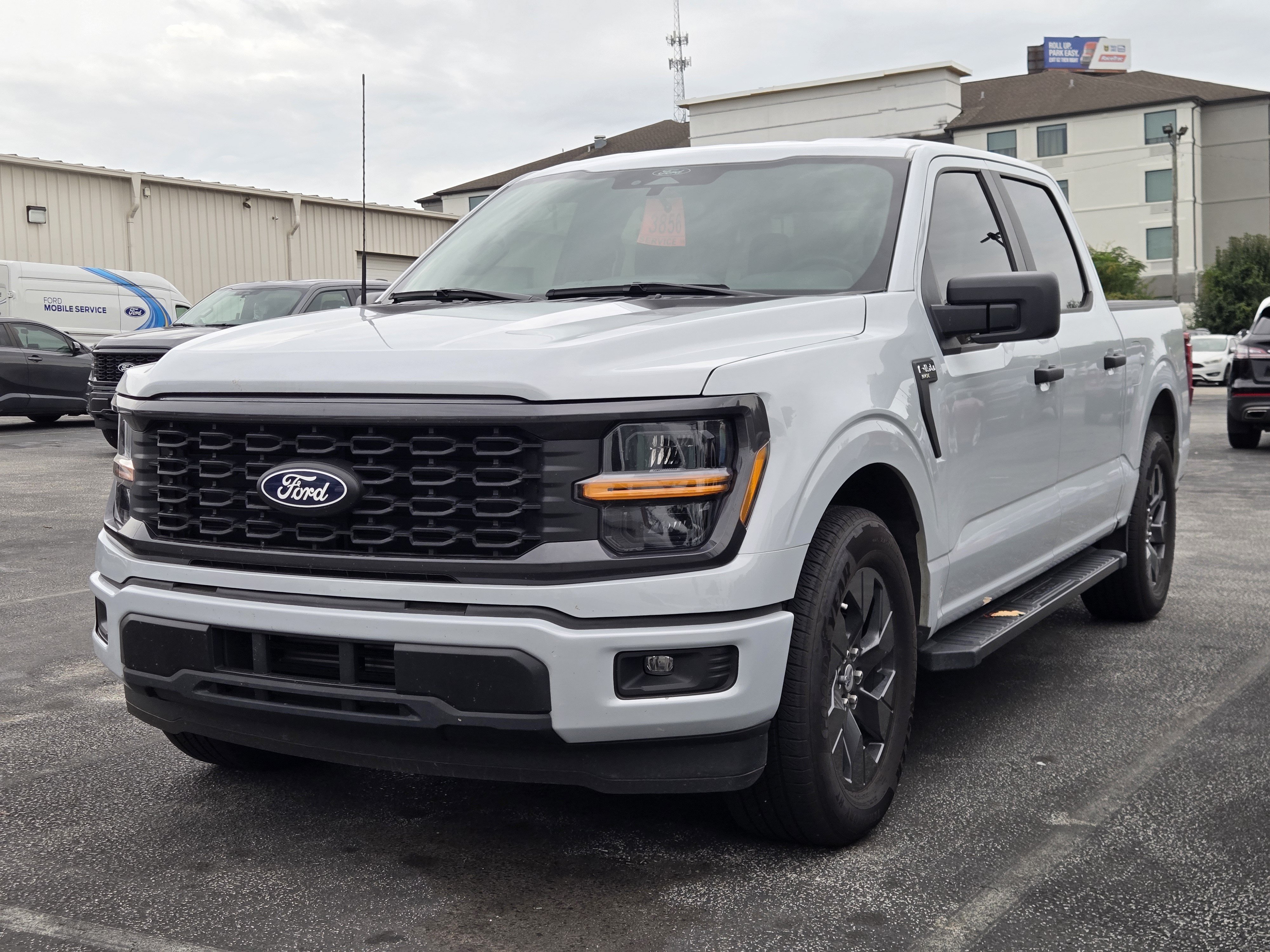 Certified Used 2025 White Metallic Ford STX image 1