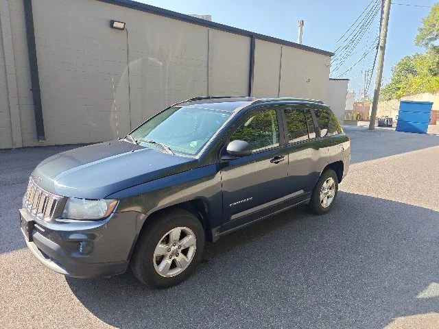 Used 2014 Maximum Steel Metallic Jeep Sport image 6