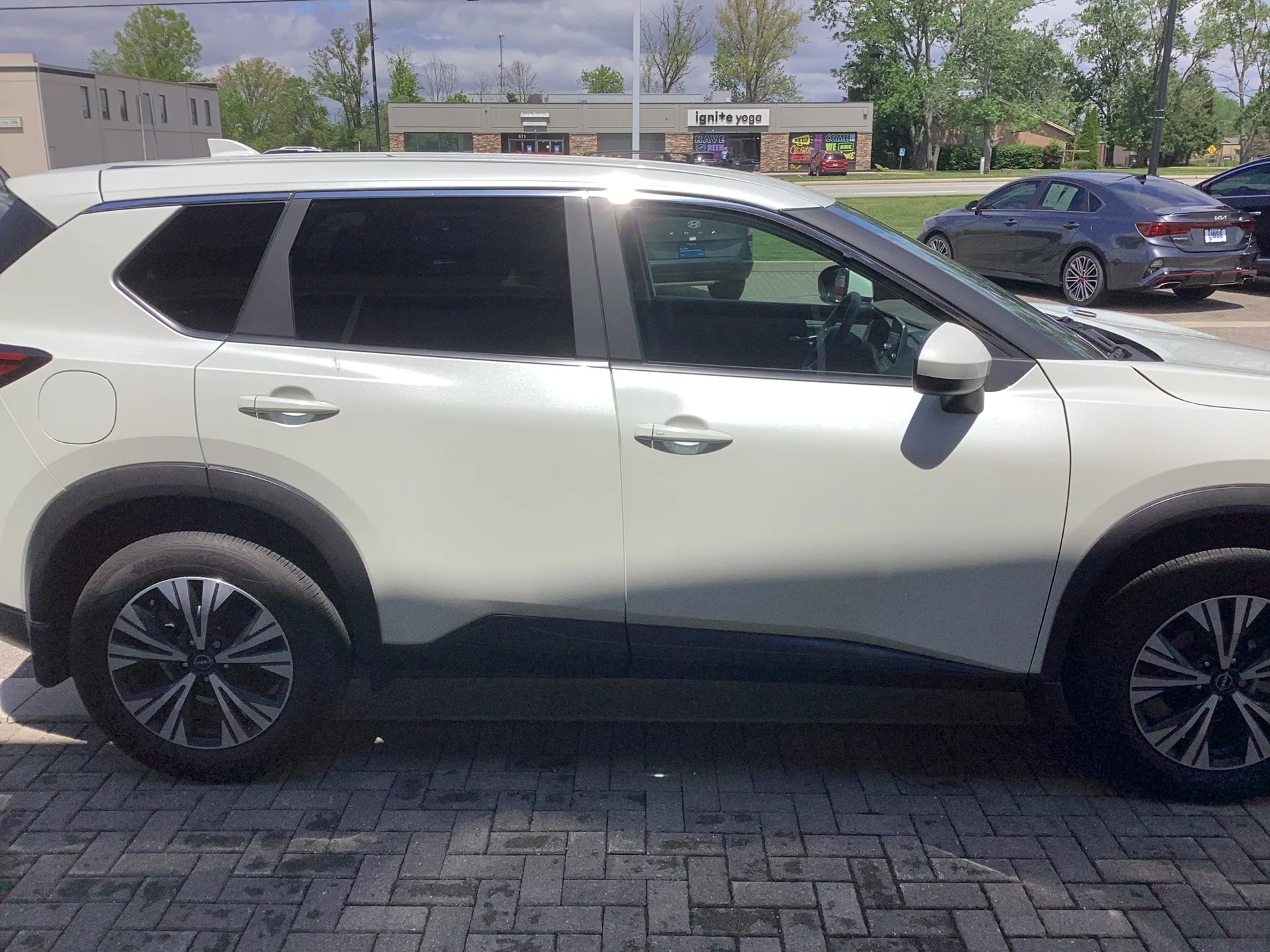 Used 2023 Pearl White TriCoat Nissan SV image 3
