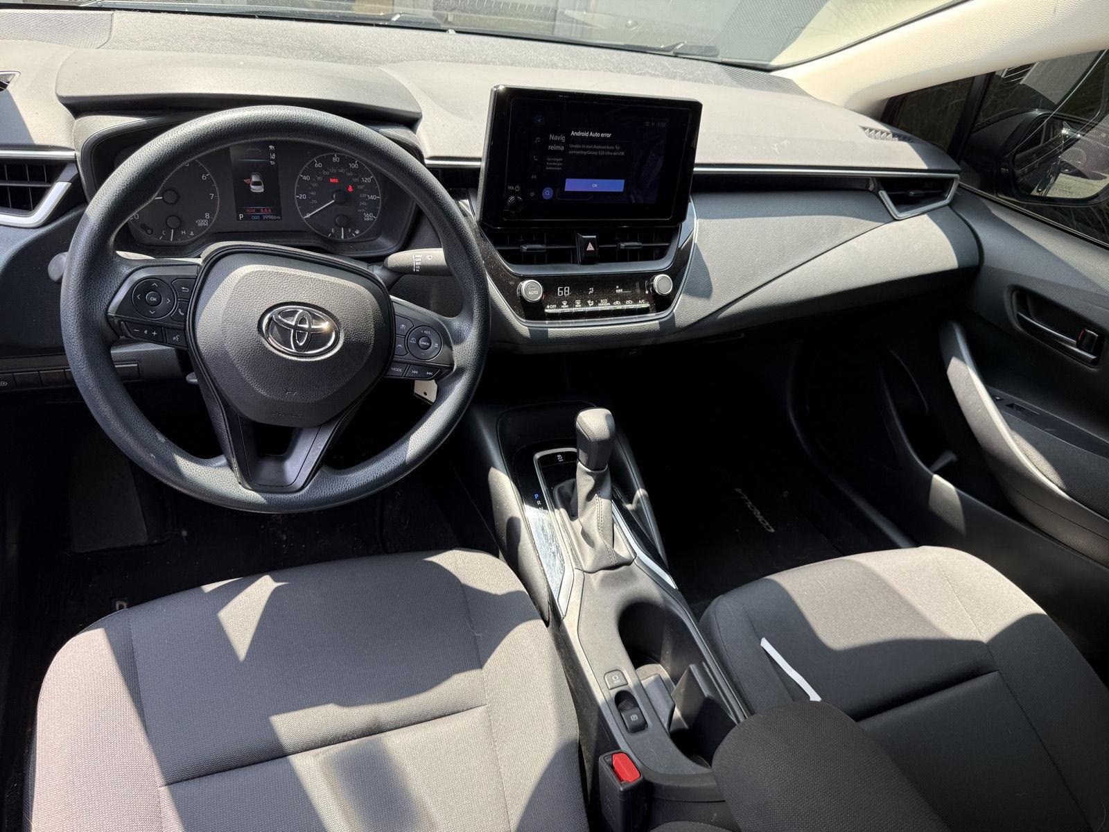 Used 2023 Midnight Black Metallic Toyota LE image 7