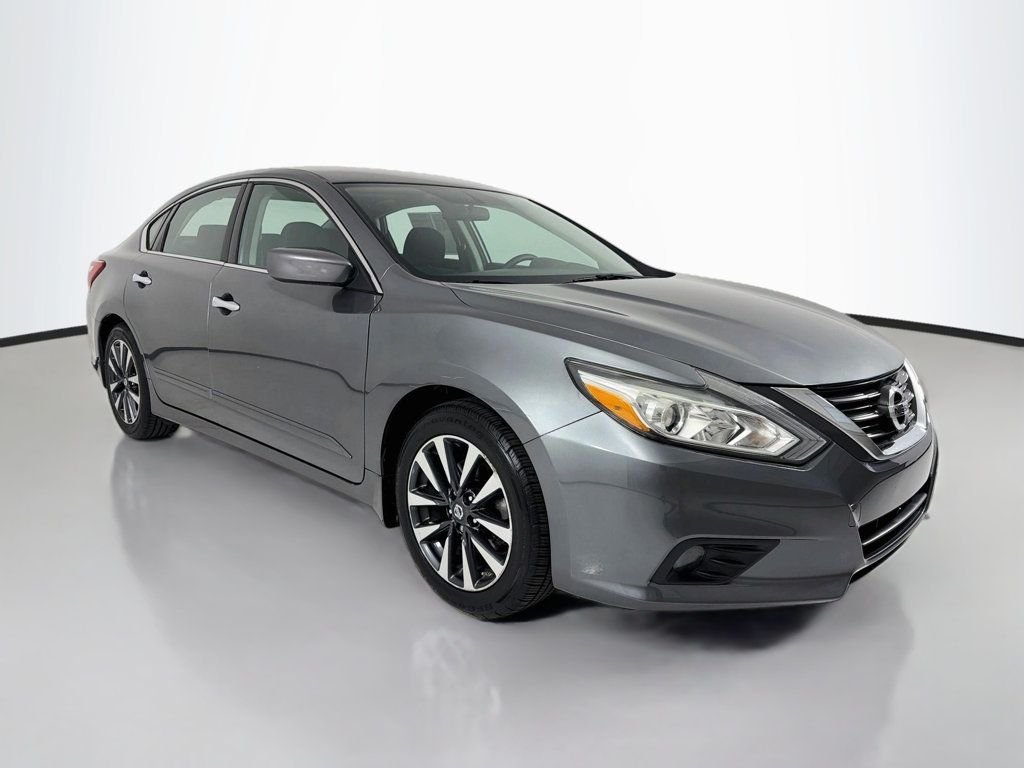Used 2016 Gun Metallic Nissan 4dr Sedan I4 2.5 SV image 1