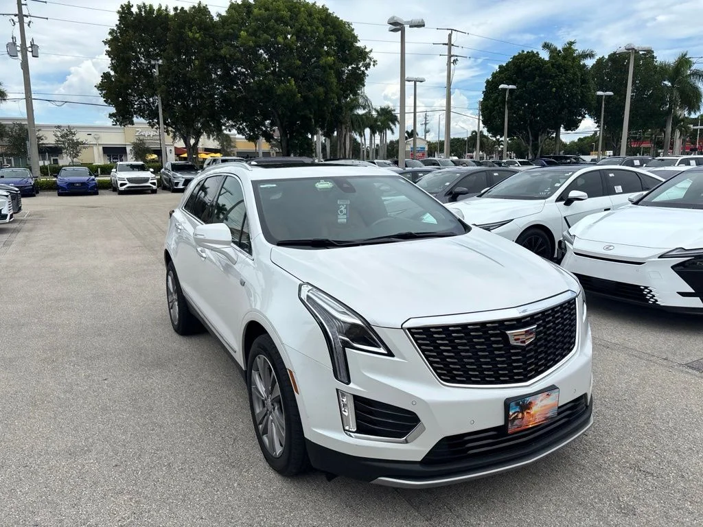 Used 2024 White Cadillac Premium Luxury image 1