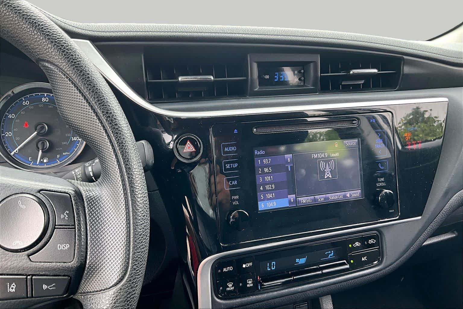 Used 2018 Super White Toyota LE image 6