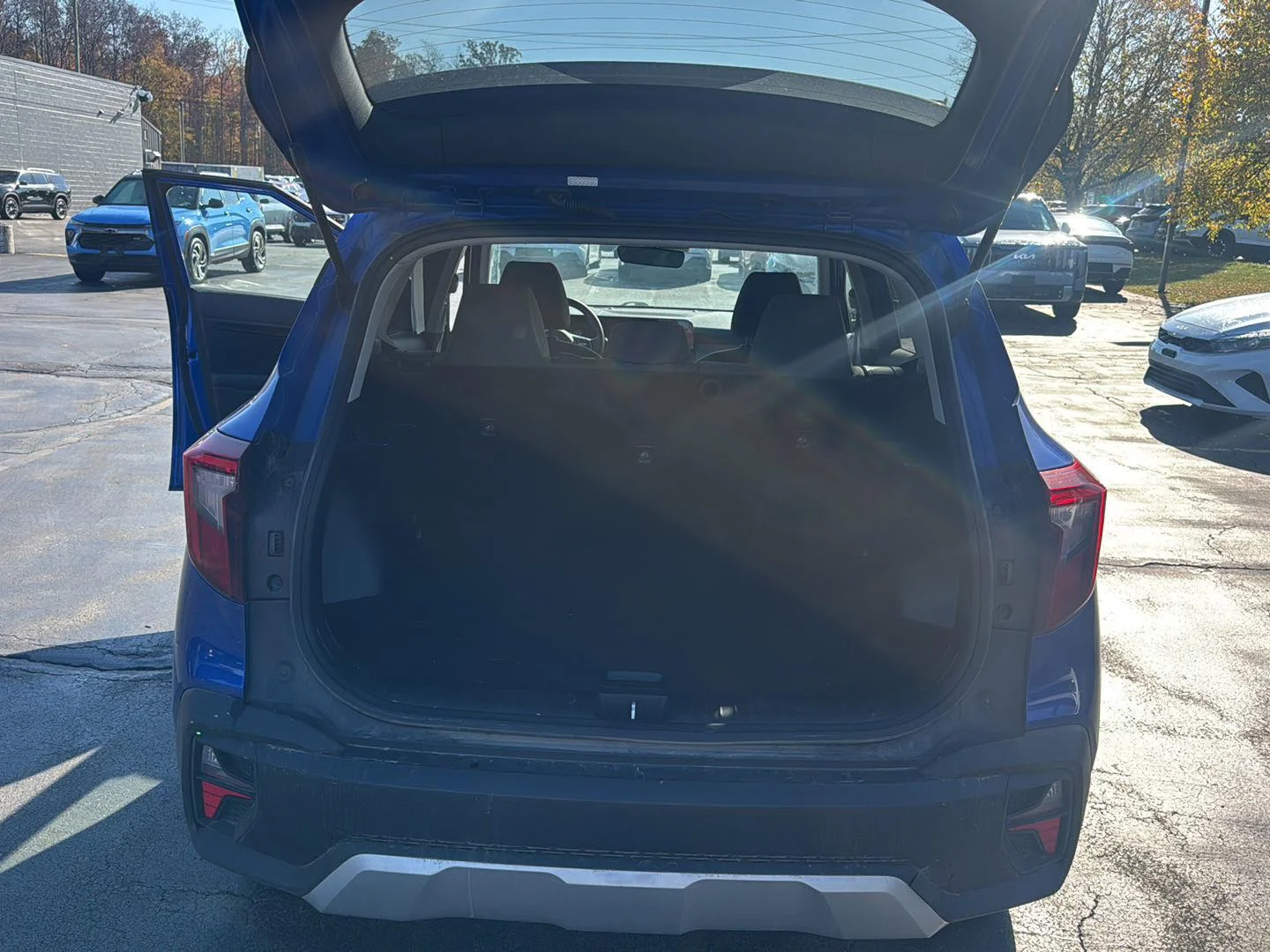 Used 2024 Neptune Blue Kia LX image 21