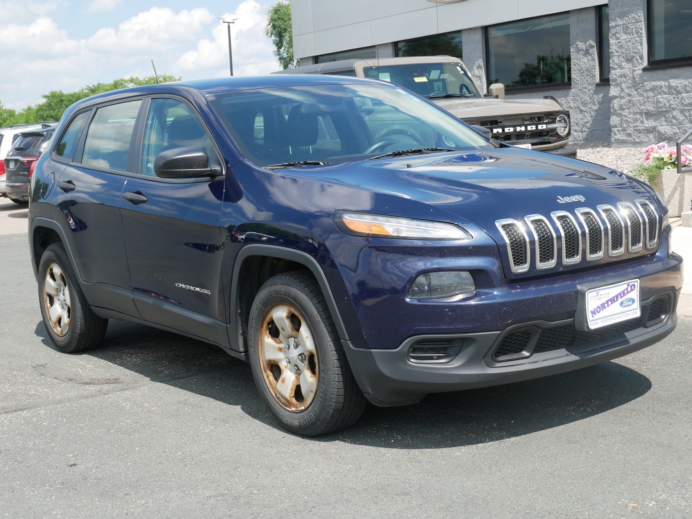 Used 2014 Jeep Cherokee Sport with VIN 1C4PJMAB1EW317261 for sale in Northfield, Minnesota