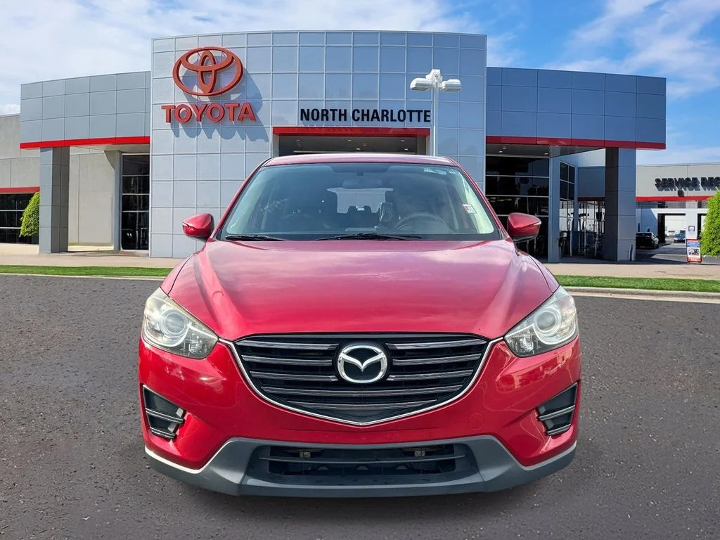 Used 2016 Mazda CX-5 Sport with VIN JM3KE2BYXG0780079 for sale in Huntersville, NC