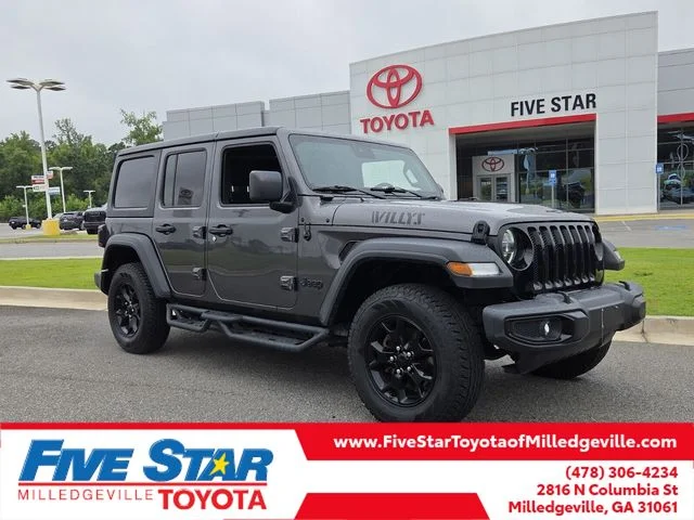 Used 2020 Gray Jeep Unlimited Sport image 1