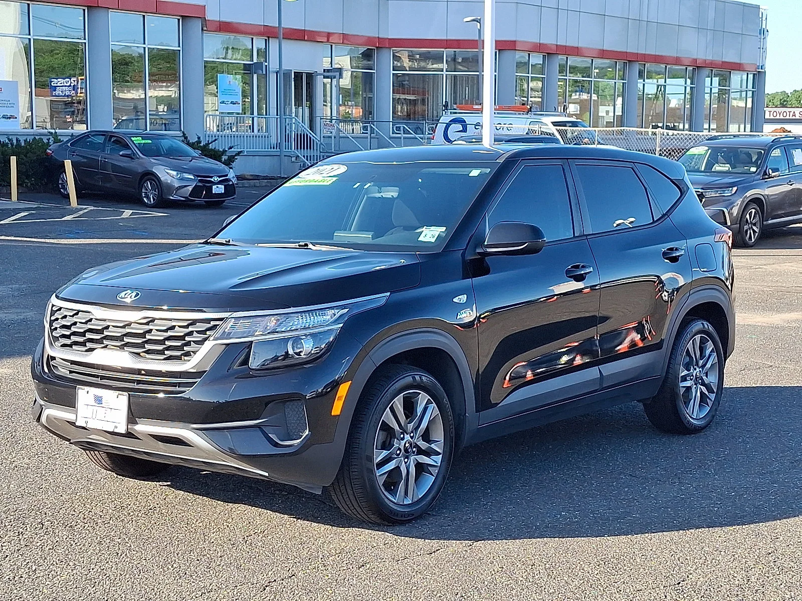 Used 2021 Cherry Black Kia LX image 3