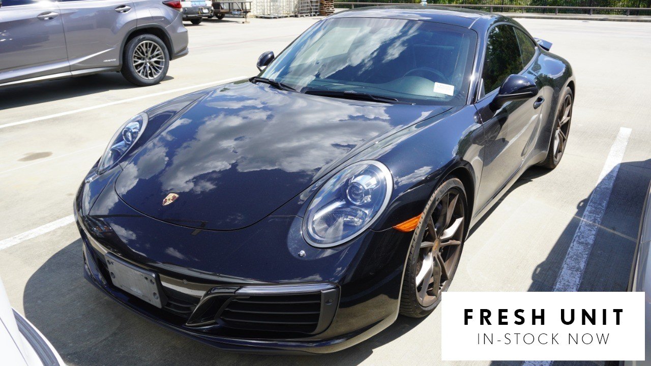 Used 2017 Black Porsche Carrera 4 image 1