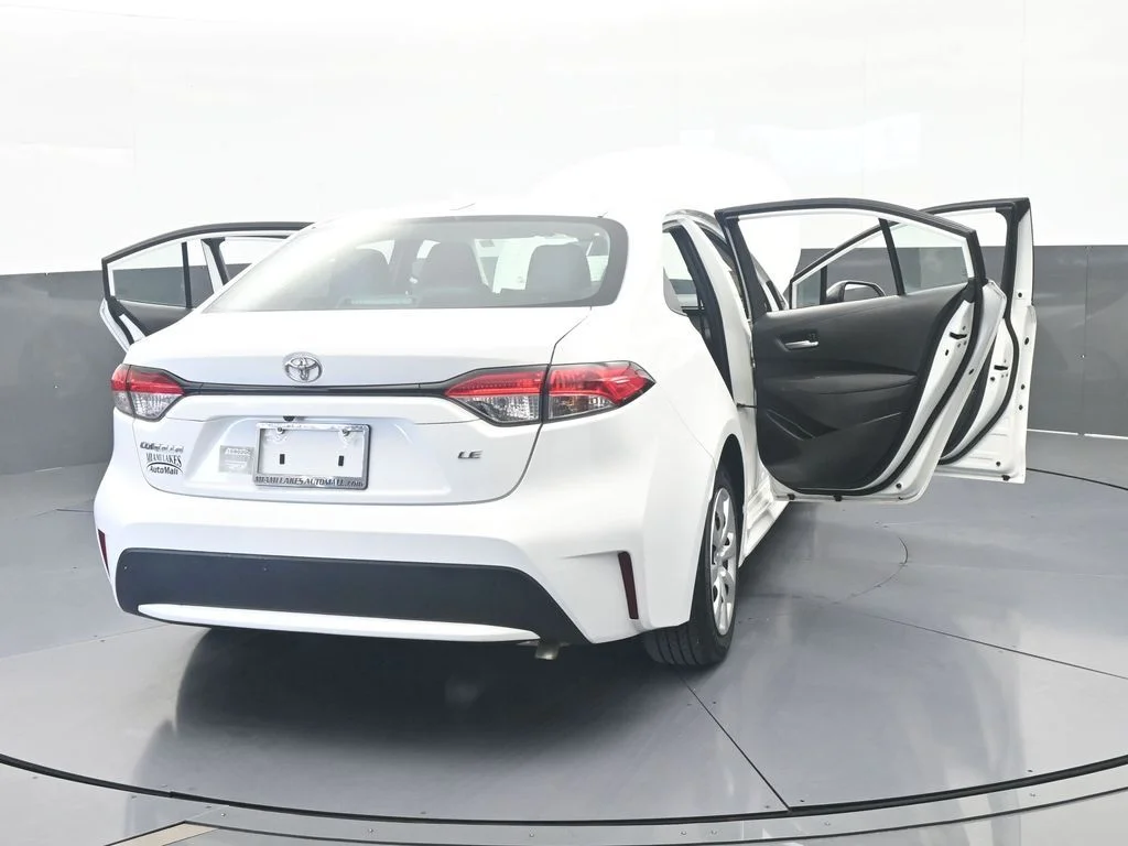 Used 2021 Super White Toyota LE image 63