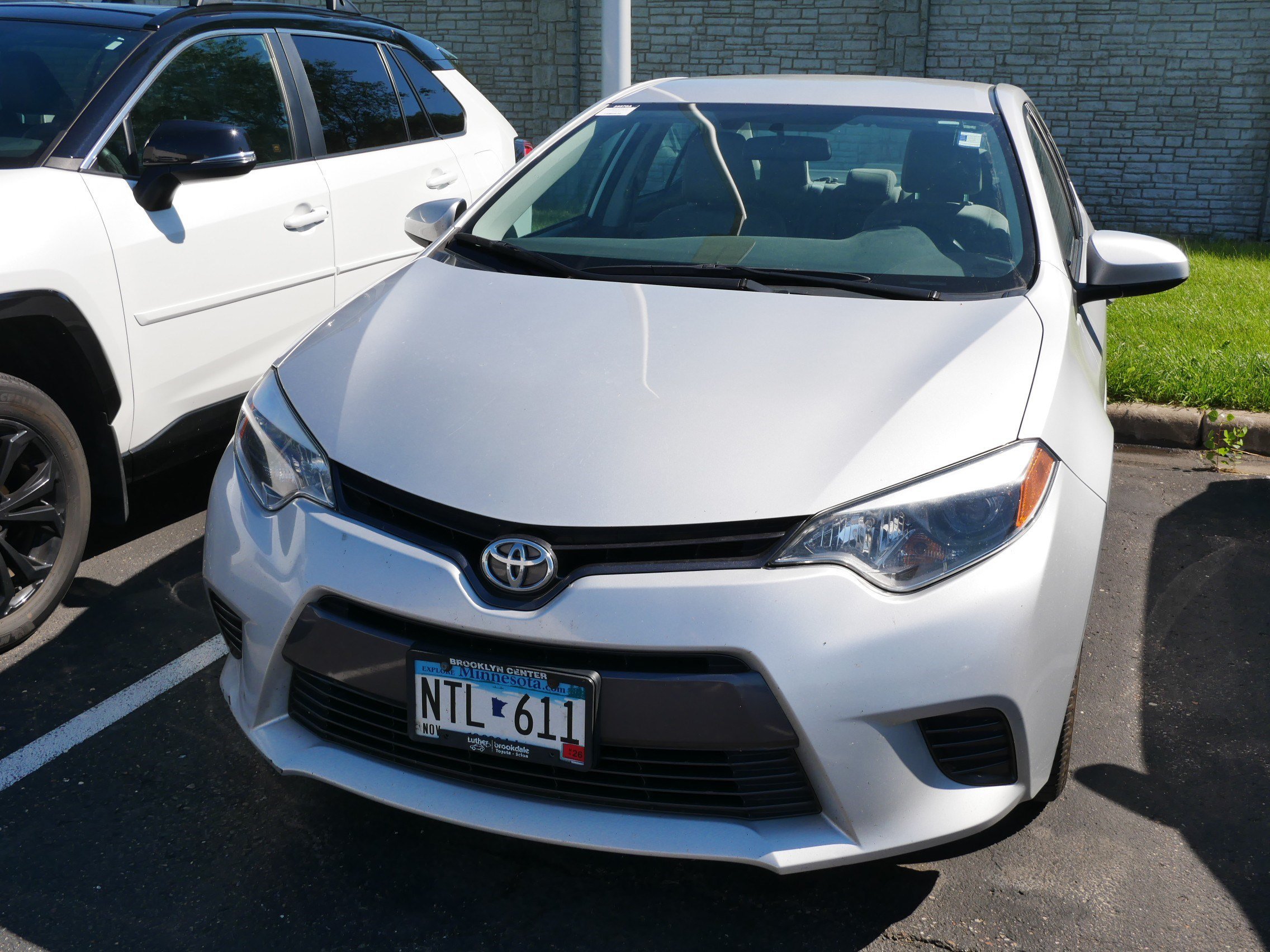 Used 2015 Classic Silver Metallic Toyota LE image 2