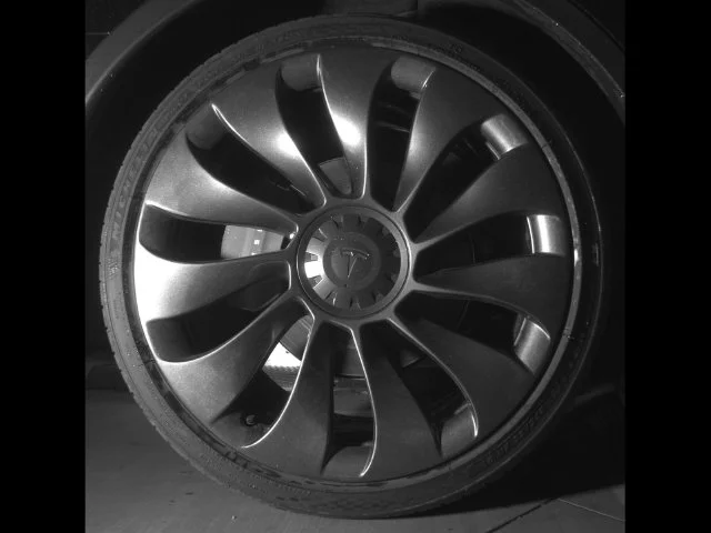 Used 2023 Solid Black Tesla Performance image 21