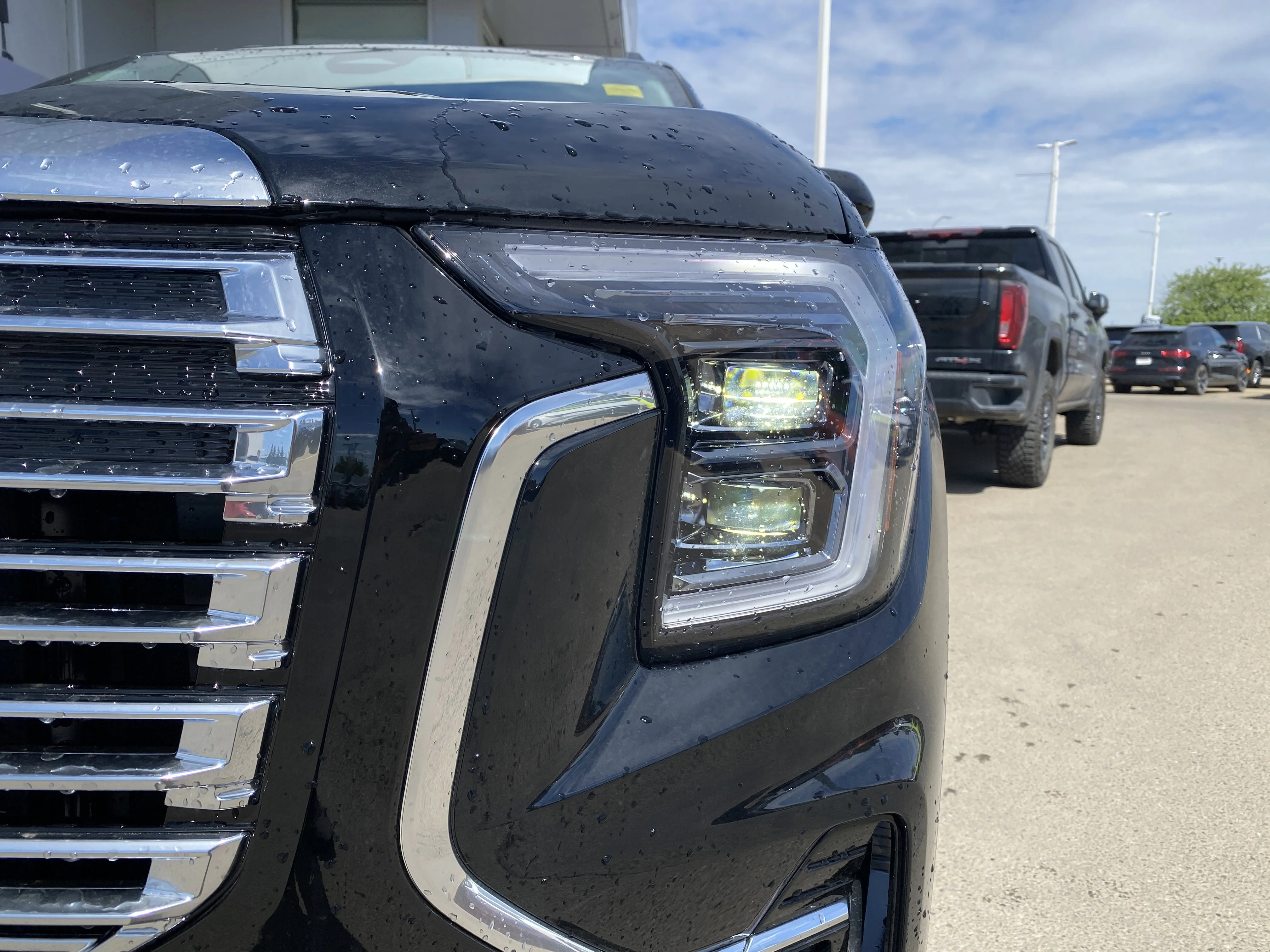 New 2026 EBONY TWILIGHT METALLIC GMC AWD Denali image 10