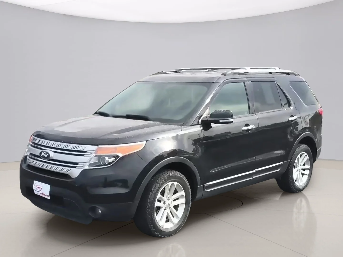 Used 2014 Black Ford XLT 4WD image 1