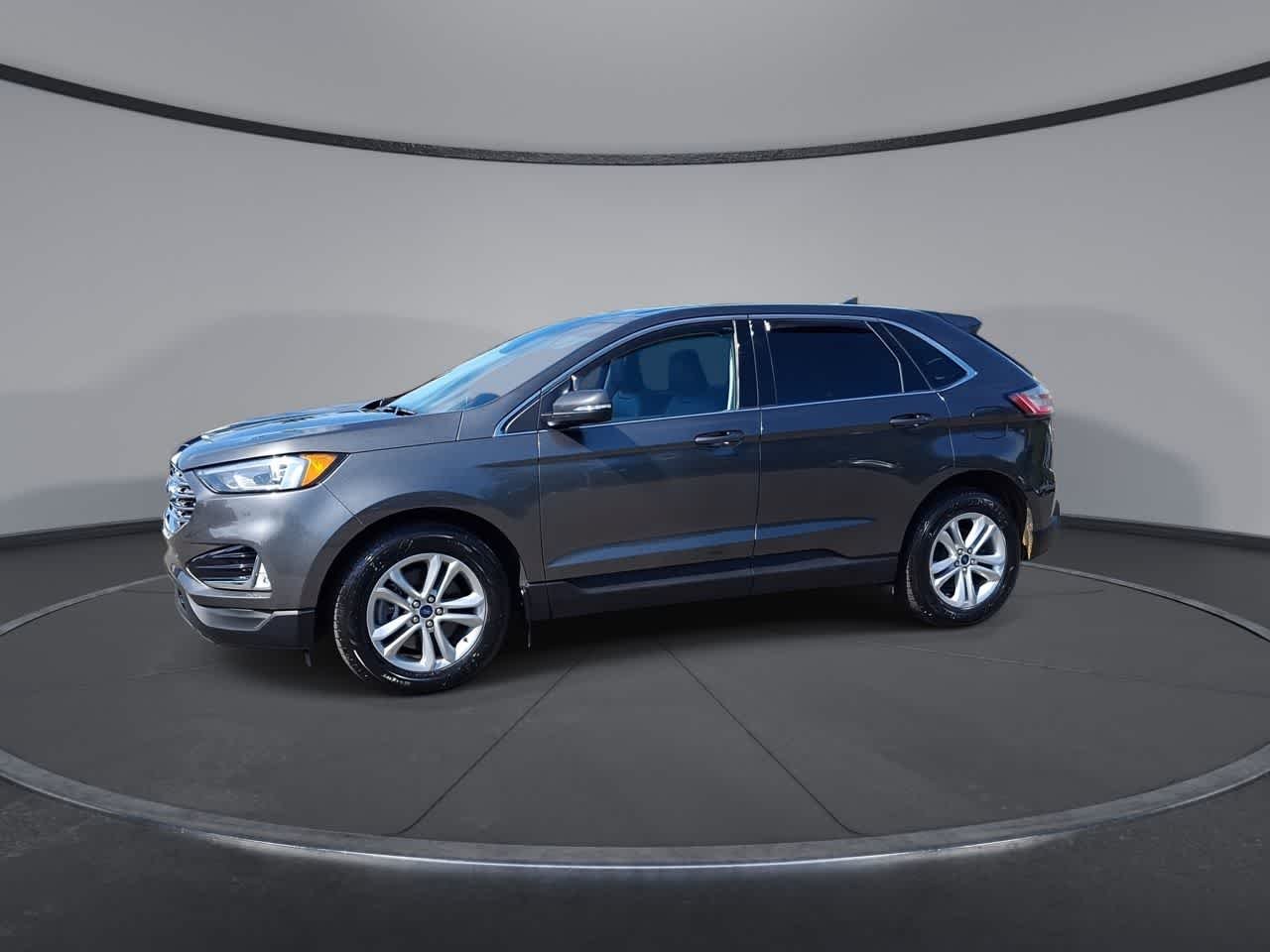 Used 2020 Magnetic Metallic Ford SEL image 4