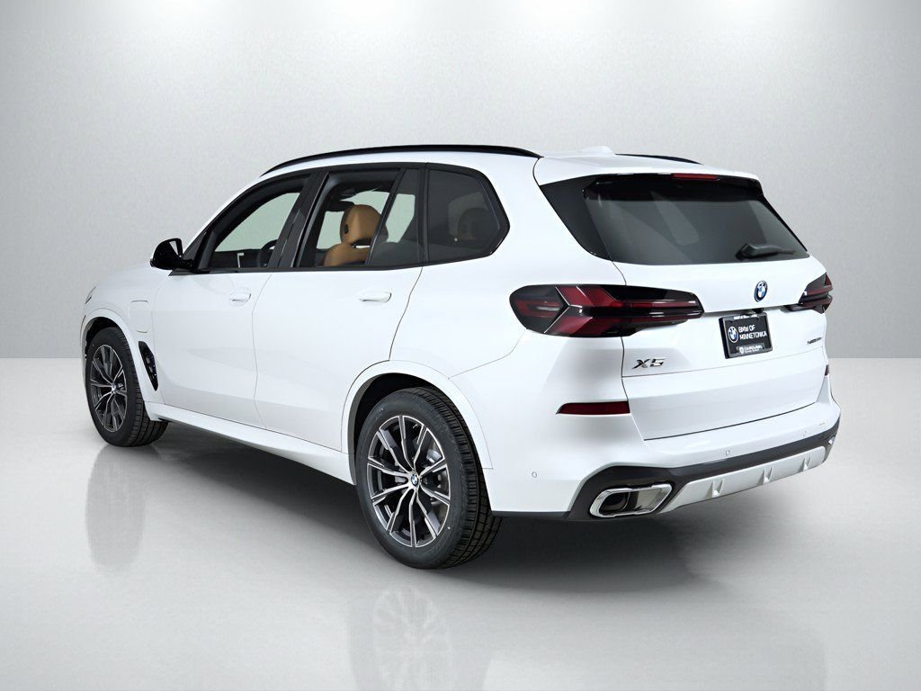 Used 2026 Mineral White Metallic BMW xDrive50e image 15