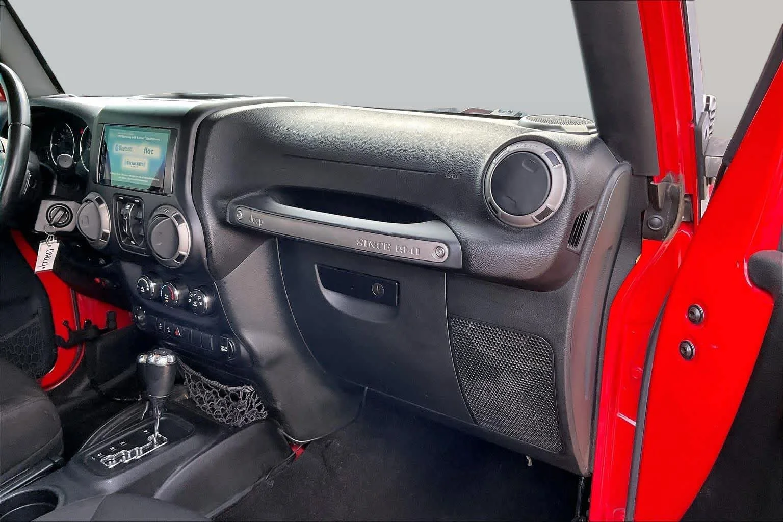 Used 2015 Firecracker Red Clear Coat Jeep Sport image 16