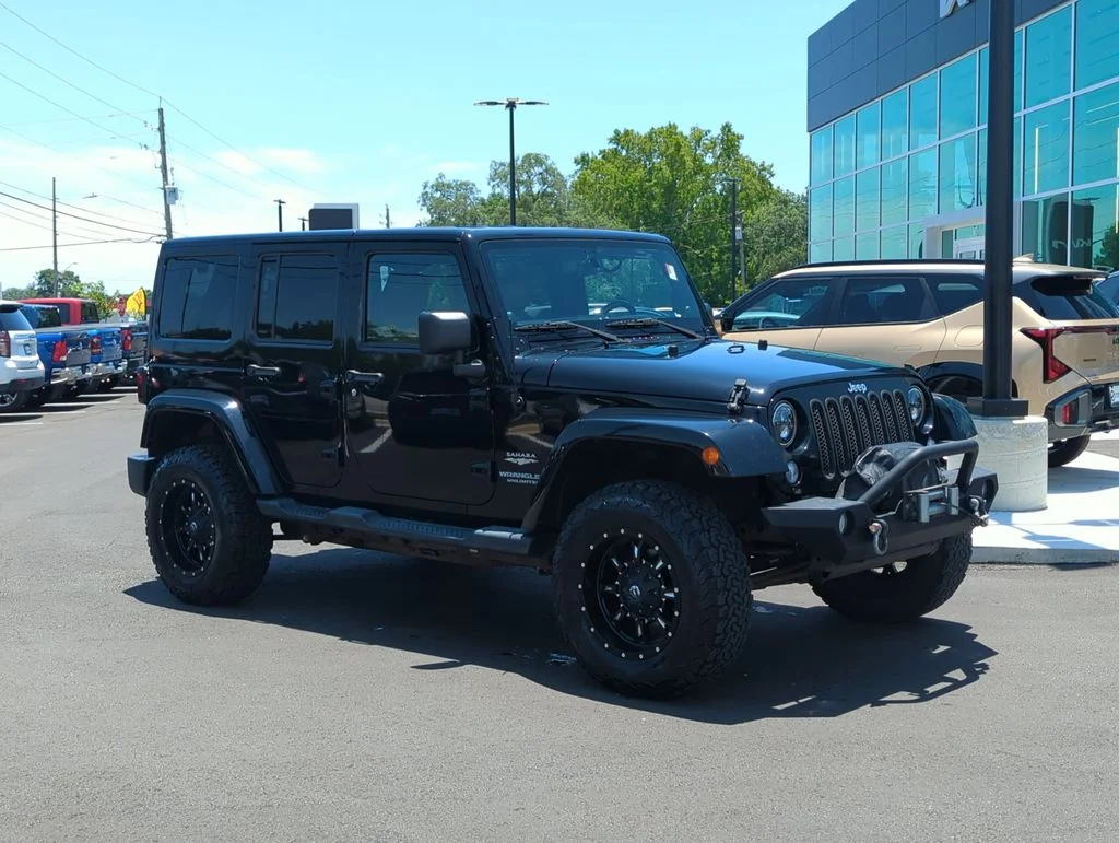 Used 2014 Black Jeep Unlimited Sahara image 9