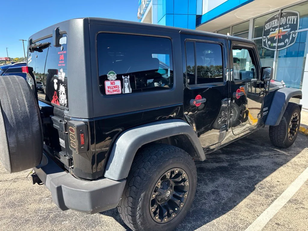 Used 2013 Black Jeep Unlimited Sport image 5