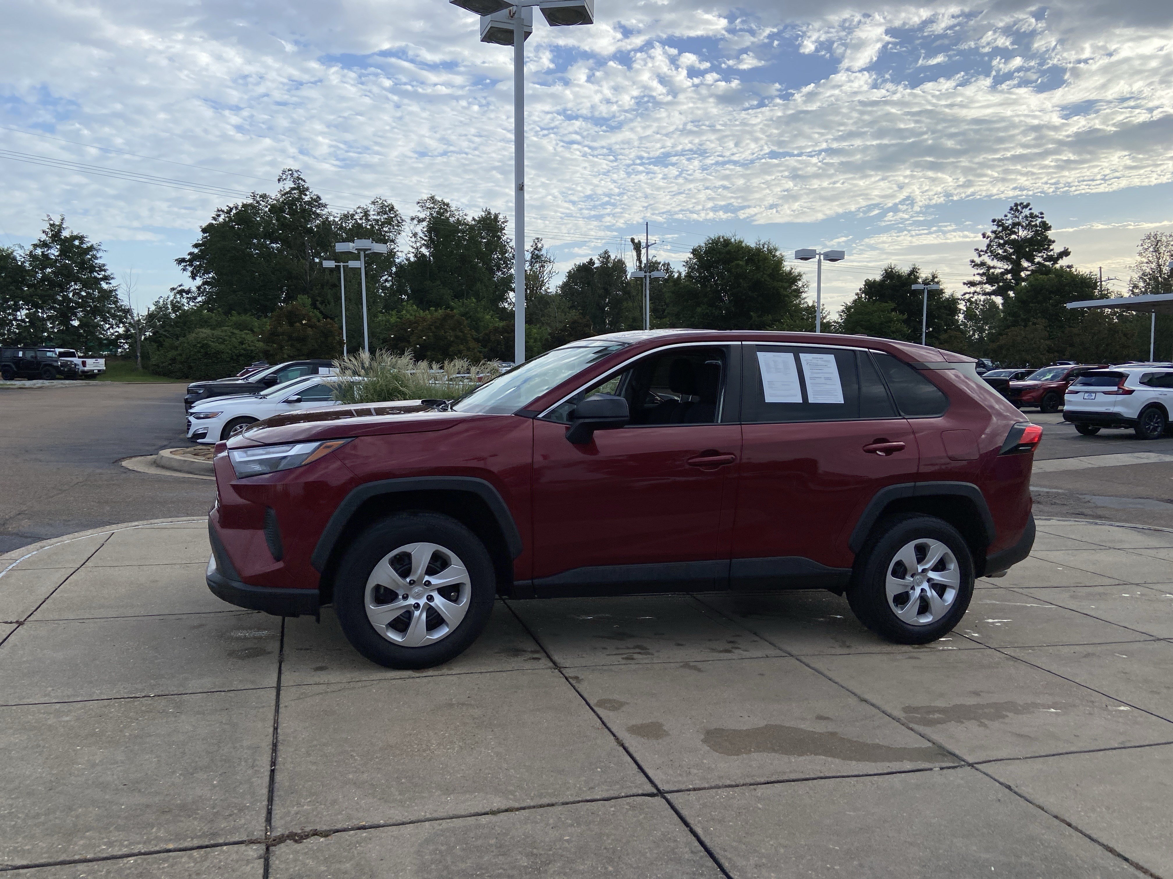 Used 2023 Ruby Flare Pearl Toyota LE image 6