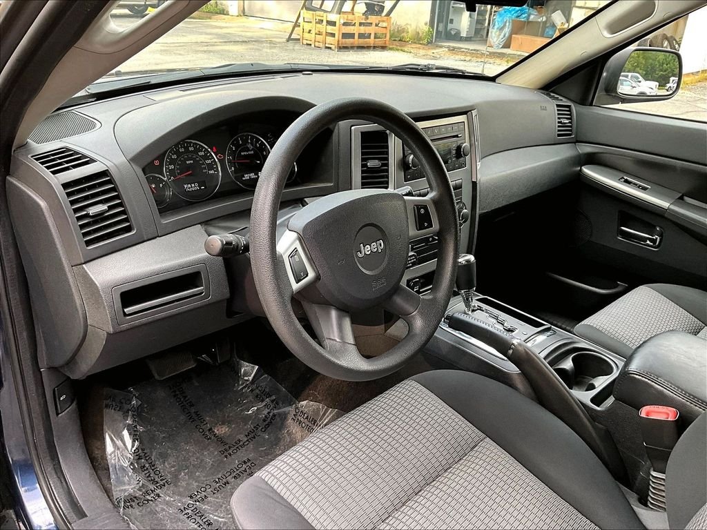 Used 2009 Modern Blue Pearlcoat Jeep Laredo image 8