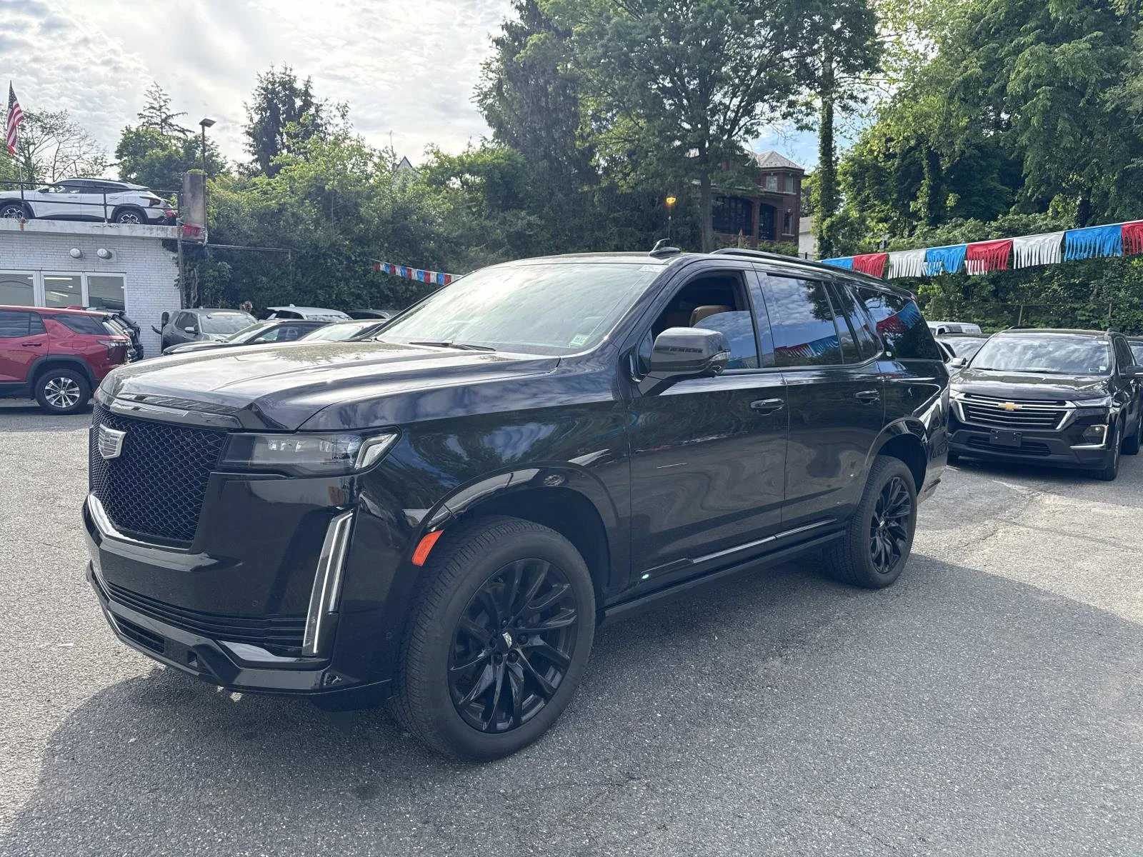 Certified Used 2023 Black Raven Cadillac Sport image 2
