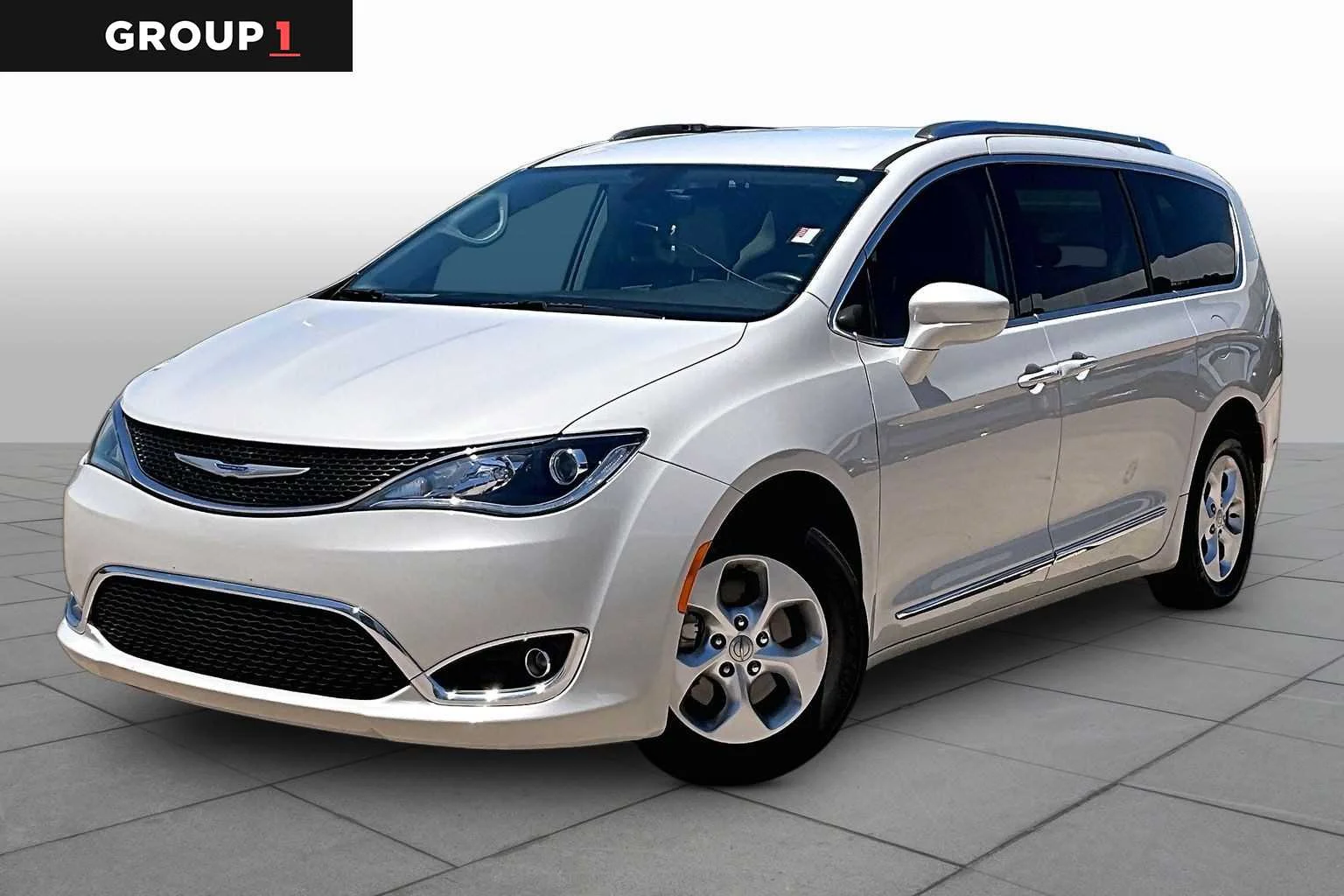 Used 2017 Tusk White Chrysler Touring-L Plus image 1
