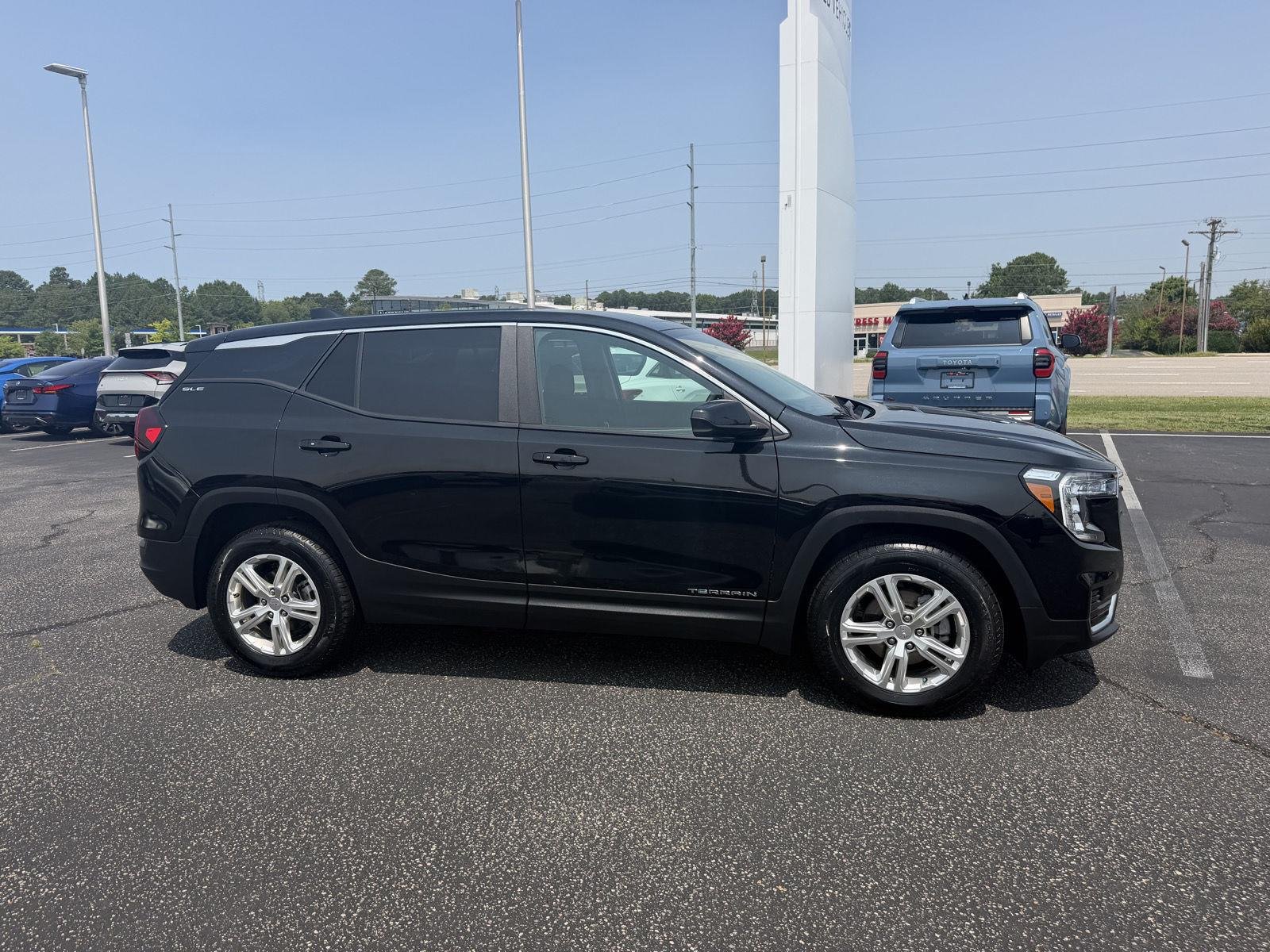 Used 2024 Ebony Twilight Metallic GMC SLE image 8